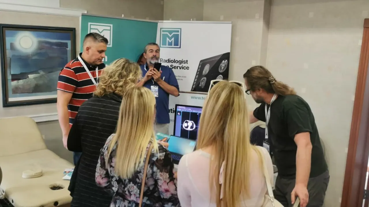 Visitors looking at a CT study on the TelMed viewer